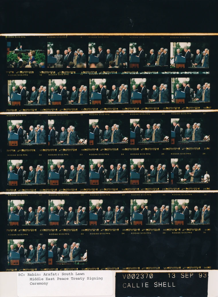 Israeli Prime Minister Yitzhak Rabin, US President Bill Clinton, and PLO Chairman Yasser Arafat at the White House, 13 September 1993, signing the Oslo Accords