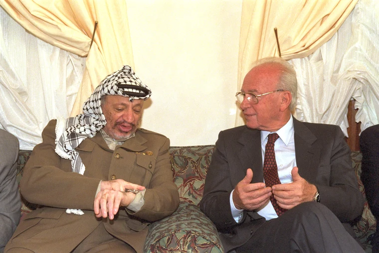 PLO Chairman Yasser Arafat, US President Bill Clinton, and Israeli Prime Minister Yitzhak Rabin at the Oslo Accords signing, 1993 — a milestone in the Palestinian national movement