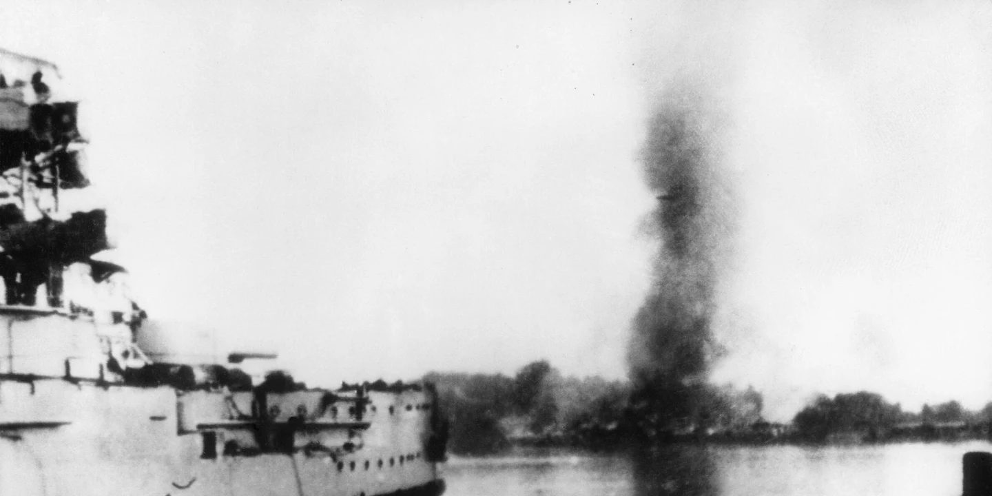 German warship bombarding the Polish coast during the invasion of Poland in September 1939 — illustrating the causes of World War 2