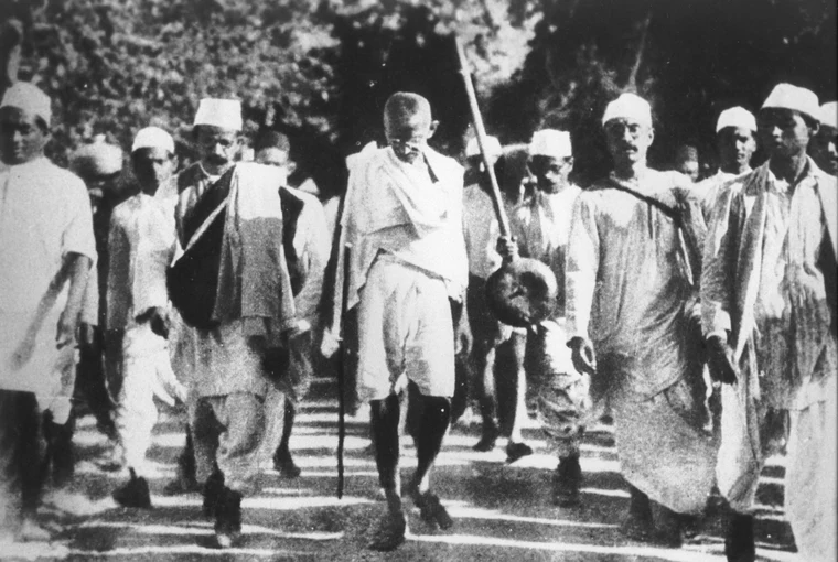 Mahatma Gandhi leading the Salt March in 1930, a pivotal act of nonviolent resistance that inspired decolonization movements worldwide