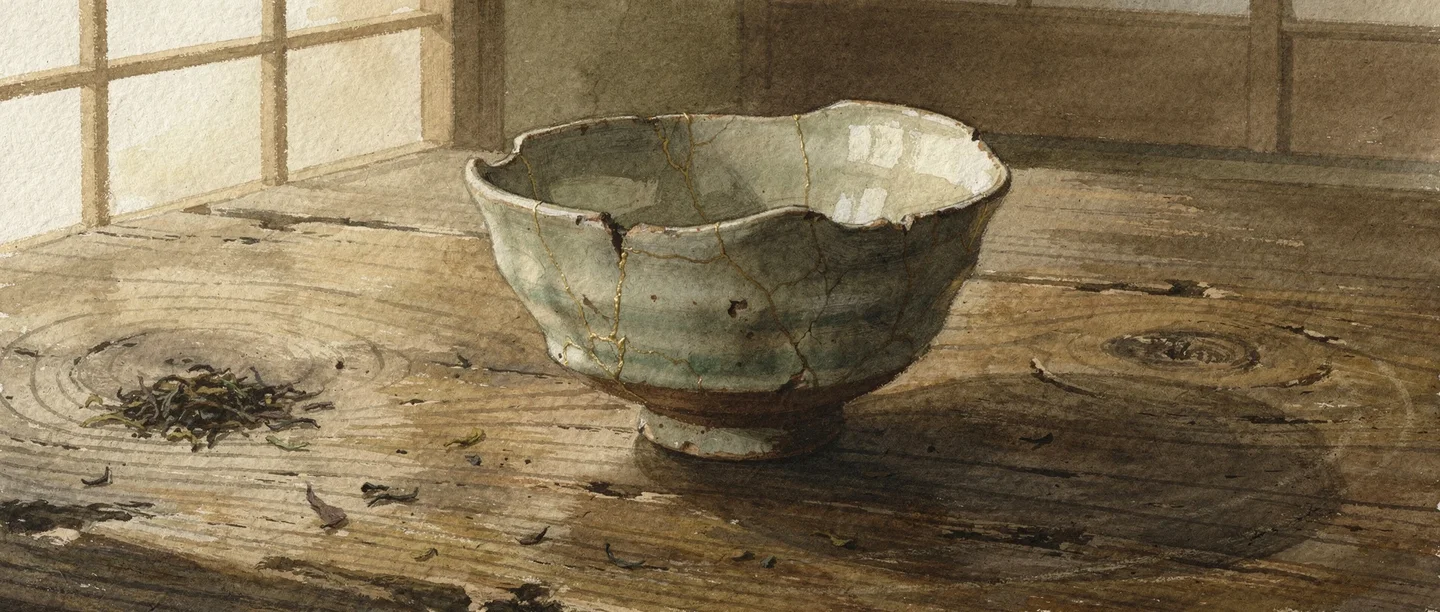 A cracked ceramic bowl repaired with gold — illustrating what is wabi-sabi and its embrace of imperfection