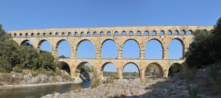 The Pont du Gard Roman aqueduct in southern France — an example of ancient Rome's extraordinary engineering legacy that still stands today