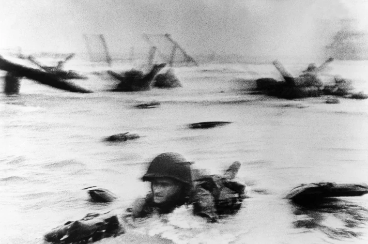 American soldiers landing on Omaha Beach under heavy fire during the D-Day invasion on 6 June 1944