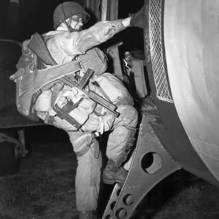 American paratroopers from the 101st Airborne Division preparing to board transport aircraft before the D-Day airborne assault