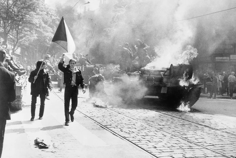 Soviet tanks in Prague during the 1968 invasion of Czechoslovakia, showing the enforcement of the Iron Curtain