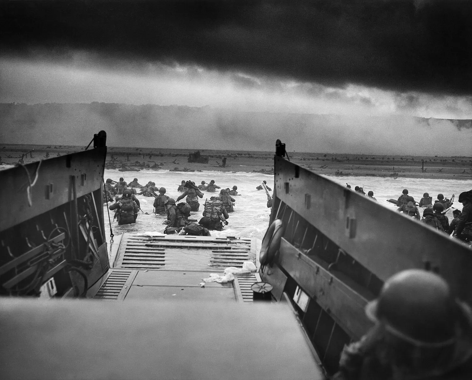 American troops wading ashore from a landing craft at Normandy on D-Day, 6 June 1944